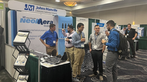 JM's Advanced Composites team welcoming visitors to their booth at the SPE ACCE Conference 