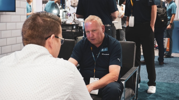 Connecting dots and people - Jeff meeting customers at a trade show Connecting dots and people - Jeff meeting customers at a trade show