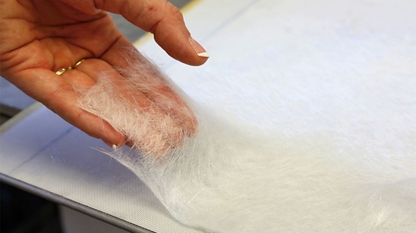 Hand sheet showing fiber dispersion pattern from a standardized test Hand sheet showing fiber dispersion pattern from a standardized test